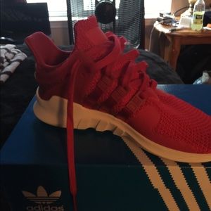 two pairs of adidas.